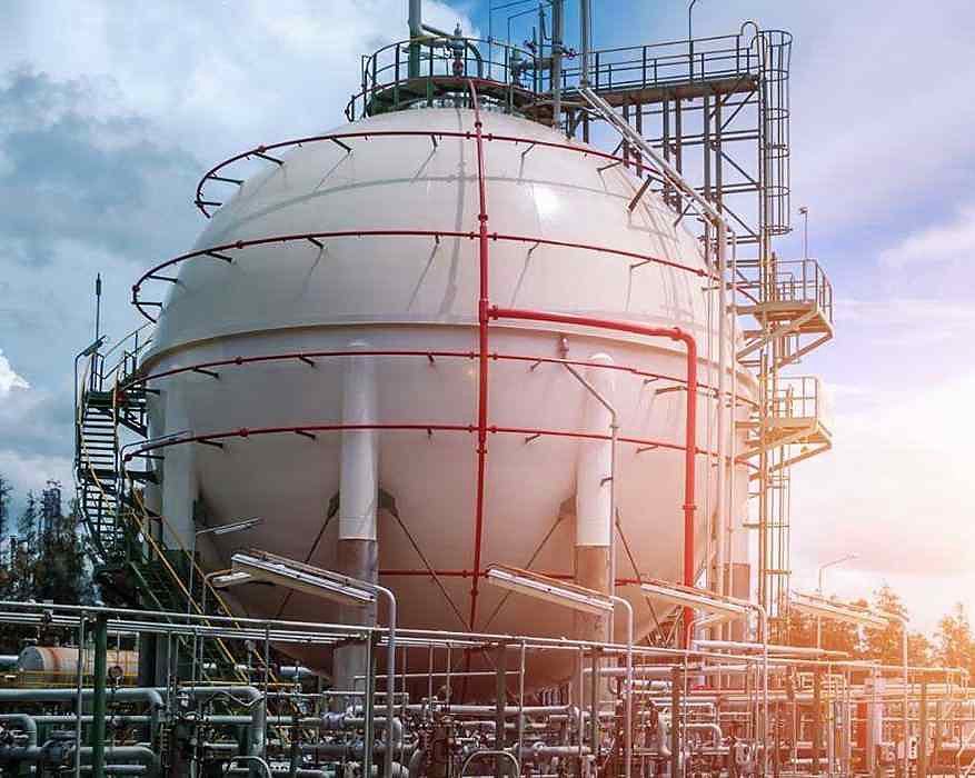 Gas storage sphere at a processing facility